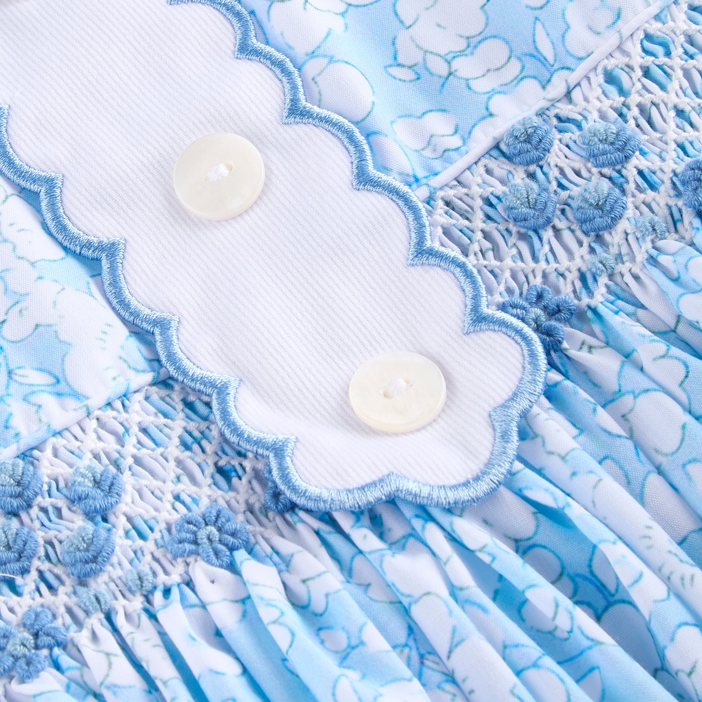Blue floral Hand Smocked Romper
