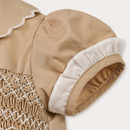 Hand Smocked Talia romper coffee cream
