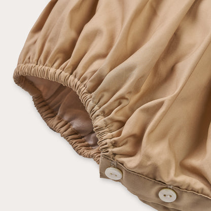 Hand Smocked Talia romper coffee cream