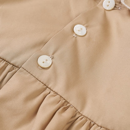 Hand Smocked Talia romper coffee cream