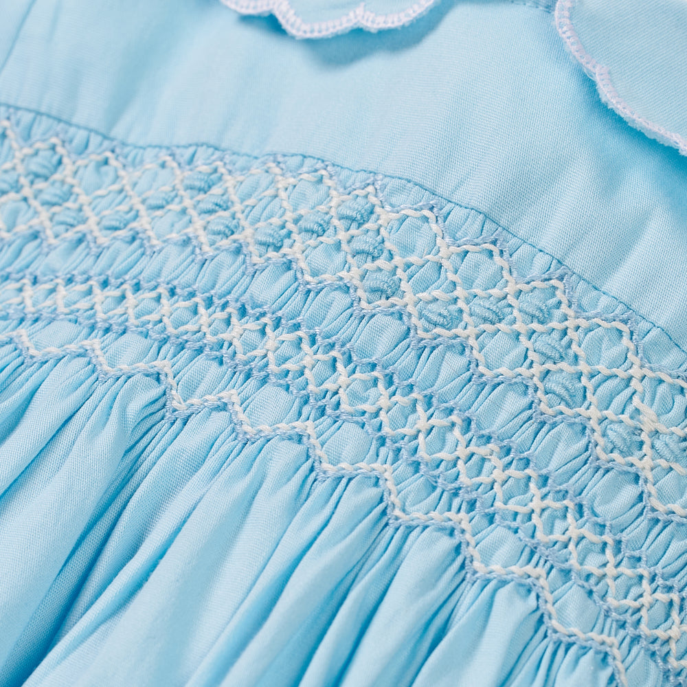 Hand Smocked Talia romper soft blue