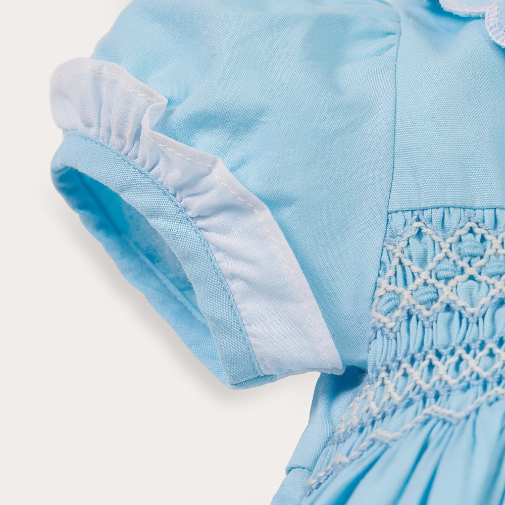 Hand Smocked Talia romper soft blue