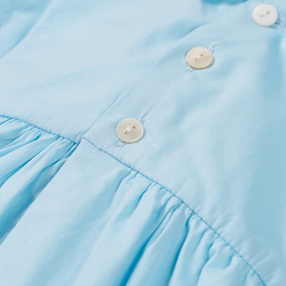 Hand Smocked Talia romper soft blue