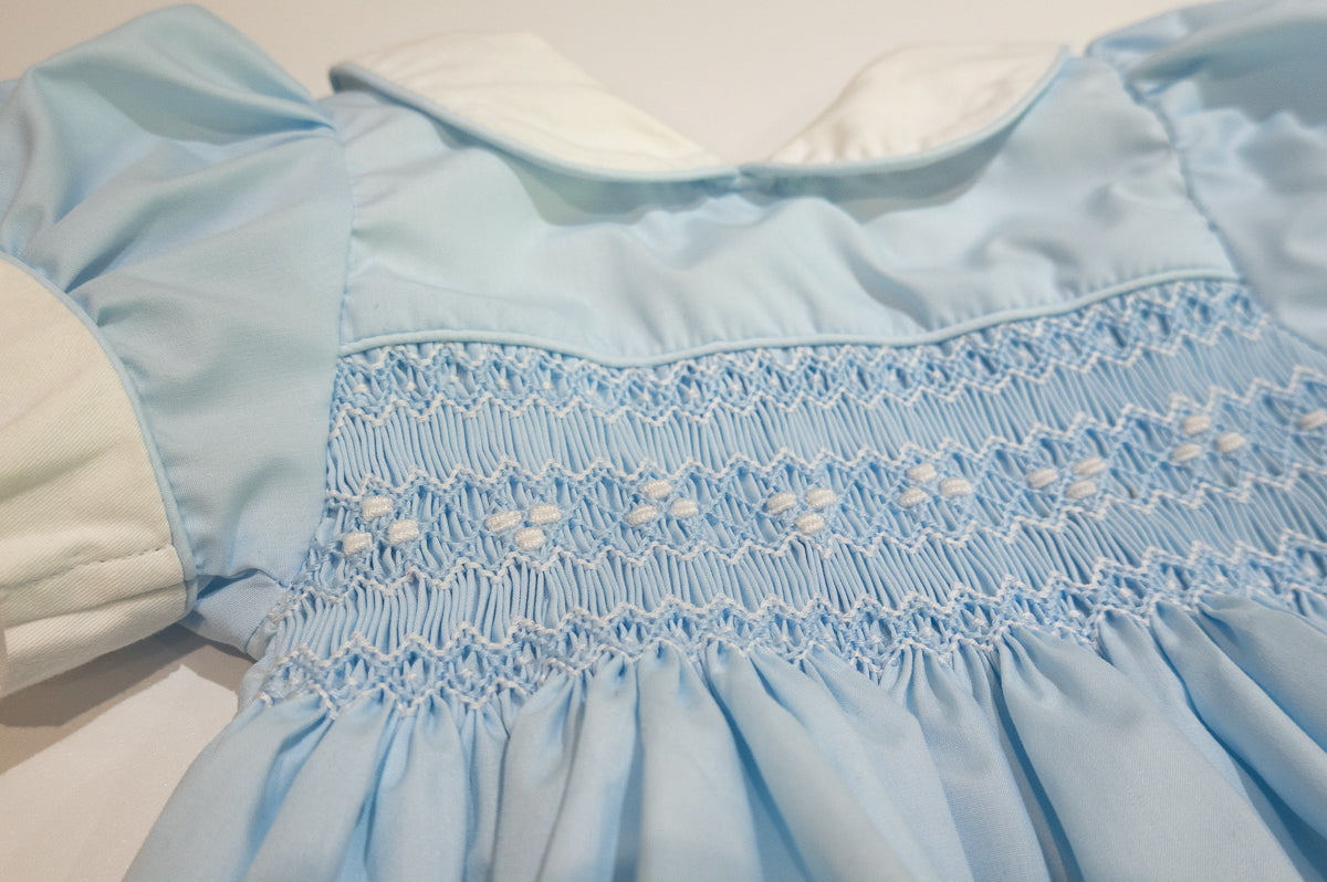 Hand Smocked Ellis romper soft blue